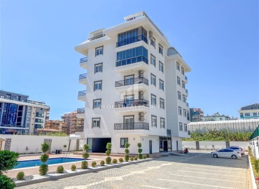 Двухкомнатная квартира, 61м², в новом комфортабельном комплексе, у моря в Каргыджаке, Алания ID-16258 фото-1
