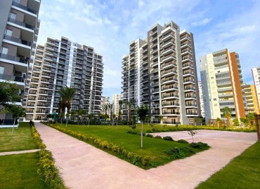 One-bedroom apartment, 60m², in a new premium residence, 380 meters from the sea in Teje, Mersin ID-16261 фото-11