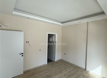 New two bedroom apartment without furniture, with laminate floors, in a new building with facilities, Oba, Alanya ID-16267 фото-7
