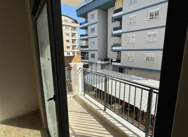 New two bedroom apartment without furniture, with laminate floors, in a new building with facilities, Oba, Alanya ID-16267 фото-11