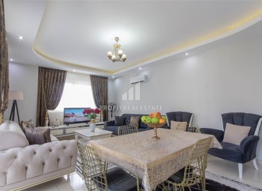 Cozy two-bedroom apartment with designer interior, 110m² 350m from the sea in Mahmutlar, Alanya ID-16269 фото-4