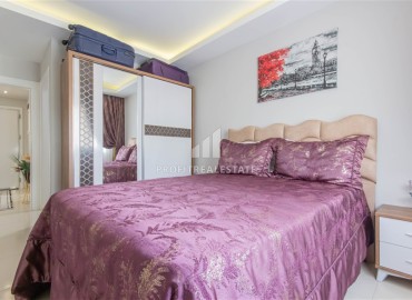 Уютная квартира с двумя спальнями и дизайнерским интерьером, 110м² в 350м от моря в Махмутларе, Алания ID-16269 фото-13