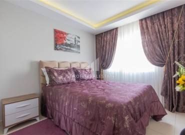 Уютная квартира с двумя спальнями и дизайнерским интерьером, 110м² в 350м от моря в Махмутларе, Алания ID-16269 фото-15