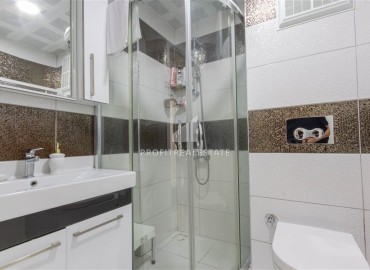 Уютная квартира с двумя спальнями и дизайнерским интерьером, 110м² в 350м от моря в Махмутларе, Алания ID-16269 фото-16