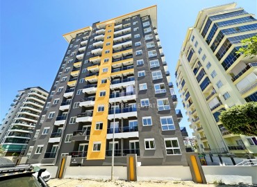Новая трехкомнатная квартира, 72м², в комплексе премиум класса в 200м от моря в Махмутларе, Алания ID-16271 фото-1