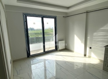 One-bedroom apartment, 55m², fully finished, in a 2023 residence with facilities in Teje, Mersin ID-16272 фото-6