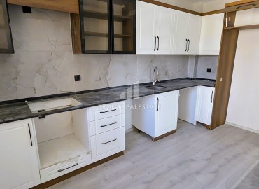 Новая трехкомнатная квартира с отдельной кухней, 110м², в районе Томюк, Эрдемли, в 550м от Средиземного моря ID-16285 фото-2