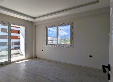 Новая трехкомнатная квартира с отдельной кухней, 110м², в районе Томюк, Эрдемли, в 550м от Средиземного моря ID-16285 фото-6