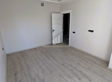 Новая трехкомнатная квартира с отдельной кухней, 110м², в районе Томюк, Эрдемли, в 550м от Средиземного моря ID-16285 фото-7