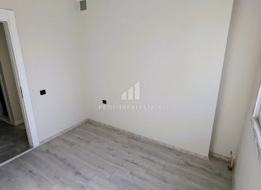 Новая трехкомнатная квартира с отдельной кухней, 110м², в районе Томюк, Эрдемли, в 550м от Средиземного моря ID-16285 фото-9