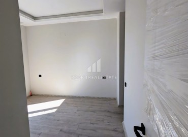Новая трехкомнатная квартира с отдельной кухней, 110м², в районе Томюк, Эрдемли, в 550м от Средиземного моря ID-16285 фото-10