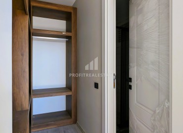 Новая трехкомнатная квартира с отдельной кухней, 110м², в районе Томюк, Эрдемли, в 550м от Средиземного моря ID-16285 фото-12