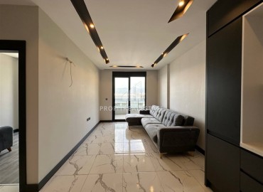 Новая квартира без мебели 1+1, со стильным кухонным гарнитуром в новостройке с инфраструктурой, Махмутлар, Аланья ID-16293 фото-3