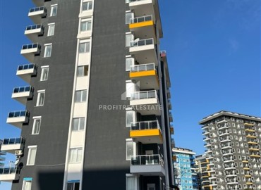 Inexpensive one bedroom furnished apartment, with fine finishing in a new residential residence, Mahmutlar, Alanya ID-16294 фото-13