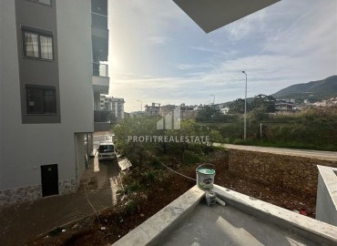 Hot offer! Inexpensive one-bedroom apartment in a new building at the final stage, Oba, Alanya ID-16313 фото-9