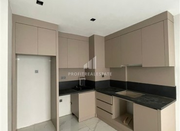 One-bedroom apartment with fine finishing, 500 meters from the sea, in a new residence in the very center of Alanya ID-16314 фото-6