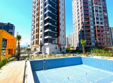 One bedroom apartment, 55m², in a residence with facilities at an excellent price in Teje, Mersin ID-16321 фото-1