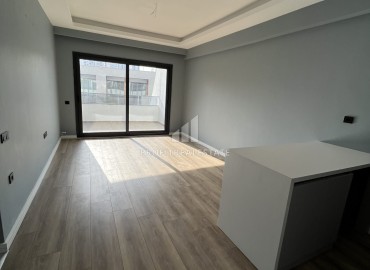 Срочная продажа: новая квартира с одной спальней, 65м², в элитном комплексе в Арпачбахшиш, Эрдемли ID-16323 фото-4