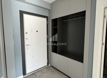 Срочная продажа: новая квартира с одной спальней, 65м², в элитном комплексе в Арпачбахшиш, Эрдемли ID-16323 фото-5