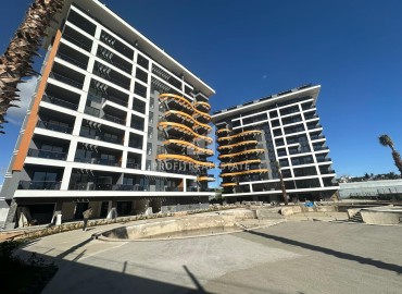 Элегантная квартира 1+1, 58м², в комплексе премиум класса на этапе ввода в эксплуатацию в Авсалларе, Алания ID-14123 фото-1