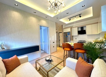 Апартаменты 1+1, 55м², в комплексе премиум класса в 500м от моря в Эрдемли, Арпачбахшиш, по отличной цене ID-16328 фото-5