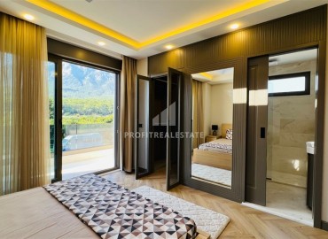 Modern villa for residence permit with 3+1 layout, 300 meters from the sea, with a separate kitchen Kemer, Antalya ID-16331 фото-15