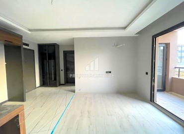 Квартира с одной спальней, 50м², в новом комплексе с бассейном в районе Томюк, Мерсин по супер цене ID-16334 фото-3