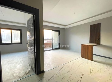 One bedroom apartment, 50m², in a new residence with a swimming pool in the Tomyuk area, Mersin at a super price ID-16334 фото-6