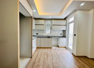 Недорогая трехкомнатная квартира без мебели в новом доме городского типа, Кепез, Анталья ID-16353 фото-4
