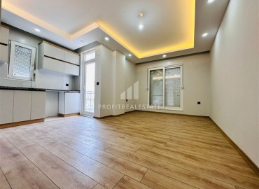 Недорогая трехкомнатная квартира без мебели в новом доме городского типа, Кепез, Анталья ID-16353 фото-7