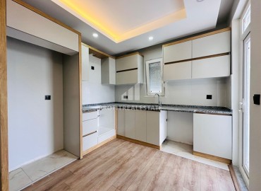 Недорогая трехкомнатная квартира без мебели в новом доме городского типа, Кепез, Анталья ID-16353 фото-8