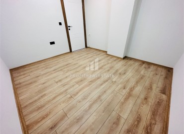 Недорогая трехкомнатная квартира без мебели в новом доме городского типа, Кепез, Анталья ID-16353 фото-19