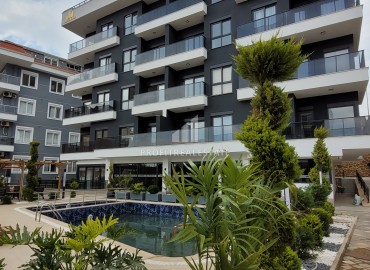 Great offer: 1+1 apartment, 44m², in a new residence with facilities in Oba, Alanya at an attractive price ID-16359 фото-1