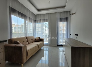 Great offer: 1+1 apartment, 44m², in a new residence with facilities in Oba, Alanya at an attractive price ID-16359 фото-3