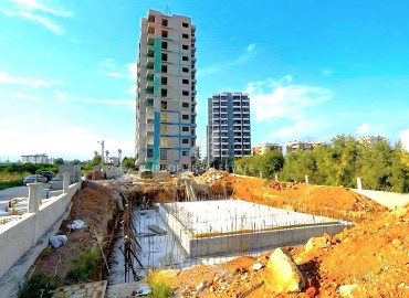 Shock price: apartment 1+1, 60m², in a premium class residence under construction in the Tomyuk area, Mersin ID-16360 фото-13