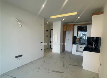Двухкомнатная квартира с чистовой отделкой и кухонным гарнитуром в новой резиденции с инфраструктурой в Авсалларе, Аланья ID-16362 фото-2
