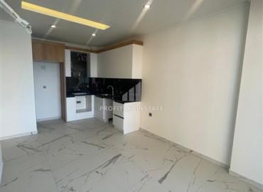 Двухкомнатная квартира с чистовой отделкой и кухонным гарнитуром в новой резиденции с инфраструктурой в Авсалларе, Аланья ID-16362 фото-4