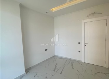 Двухкомнатная квартира с чистовой отделкой и кухонным гарнитуром в новой резиденции с инфраструктурой в Авсалларе, Аланья ID-16362 фото-12