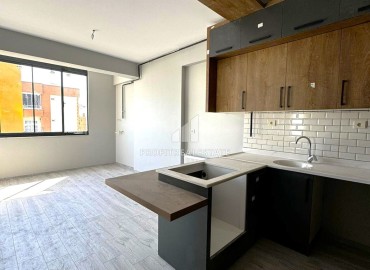 Apartment 1+1, 60m², in an inexpensive new building in the center of Mezitli, Mersin, at an attractive price ID-16367 фото-4