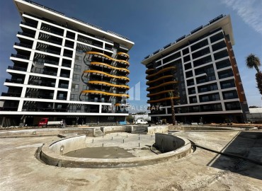 Апартаменты 1+1, 57,5м², в комплексе премиум класса на окончательном этапе строительства в Авсалларе, Алания ID-16368 фото-5
