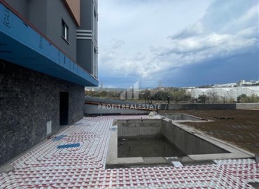 Апартаменты 1+1, 57,5м², в комплексе премиум класса на окончательном этапе строительства в Авсалларе, Алания ID-16368 фото-9