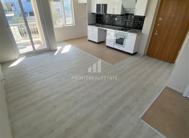 Inexpensive one bedroom apartment in a new building, with a built-in kitchen and household appliances, Kepez, Antalya ID-16375 фото-4