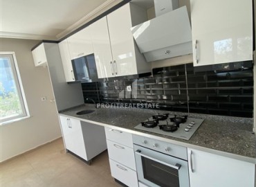 Inexpensive one bedroom apartment in a new building, with a built-in kitchen and household appliances, Kepez, Antalya ID-16375 фото-7