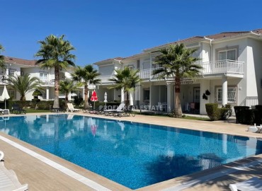 Cozy inexpensive two-bedroom villa, 75m², in a cottage residence, Kemer, Antalya ID-16380 фото-1