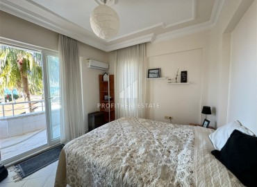 Меблированная квартира с двумя спальнями и отдельной кухней, 115м², в 100м от моря в Махмутларе, Алания ID-16406 фото-9