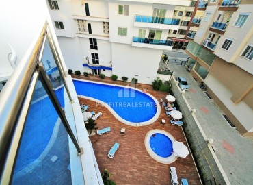 Furnished one-bedroom apartment, 65m², in a premium residence 300m from the sea in the center of Mahmutlar, Alanya. ID-16413 фото-11