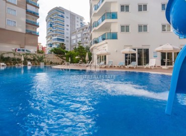 Furnished one-bedroom apartment, 65m², in a premium residence 300m from the sea in the center of Mahmutlar, Alanya. ID-16413 фото-12