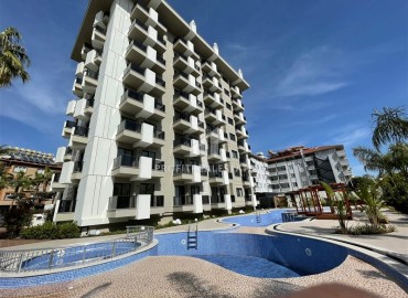 Two bedroom apartment, 74m², in a new project in the center of Alanya, under construction, 300m from the sea ID-12901 фото-1