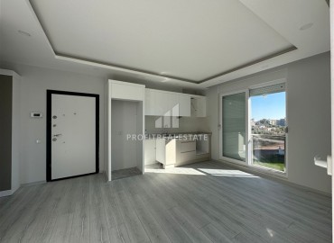 Hot offer! Inexpensive 1+1 apartment in a new building, unfurnished, with built-in kitchen, Doşemealti, Antalya ID-16416 фото-3