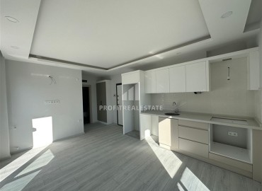 Hot offer! Inexpensive 1+1 apartment in a new building, unfurnished, with built-in kitchen, Doşemealti, Antalya ID-16416 фото-5